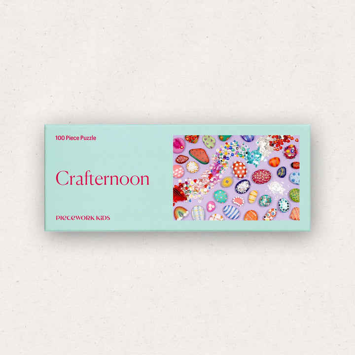 Box of a 100 piece puzzle on a white background