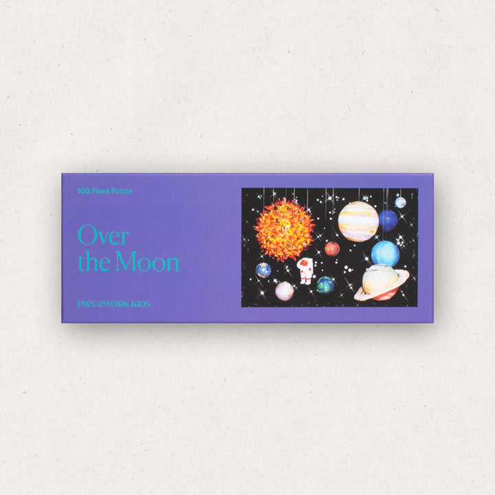 Puzzle box titled 'Over the Moon' with space-themed illustration on a white background