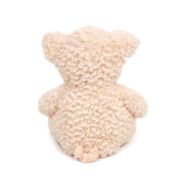 Plush toy resembling a pig on a white background